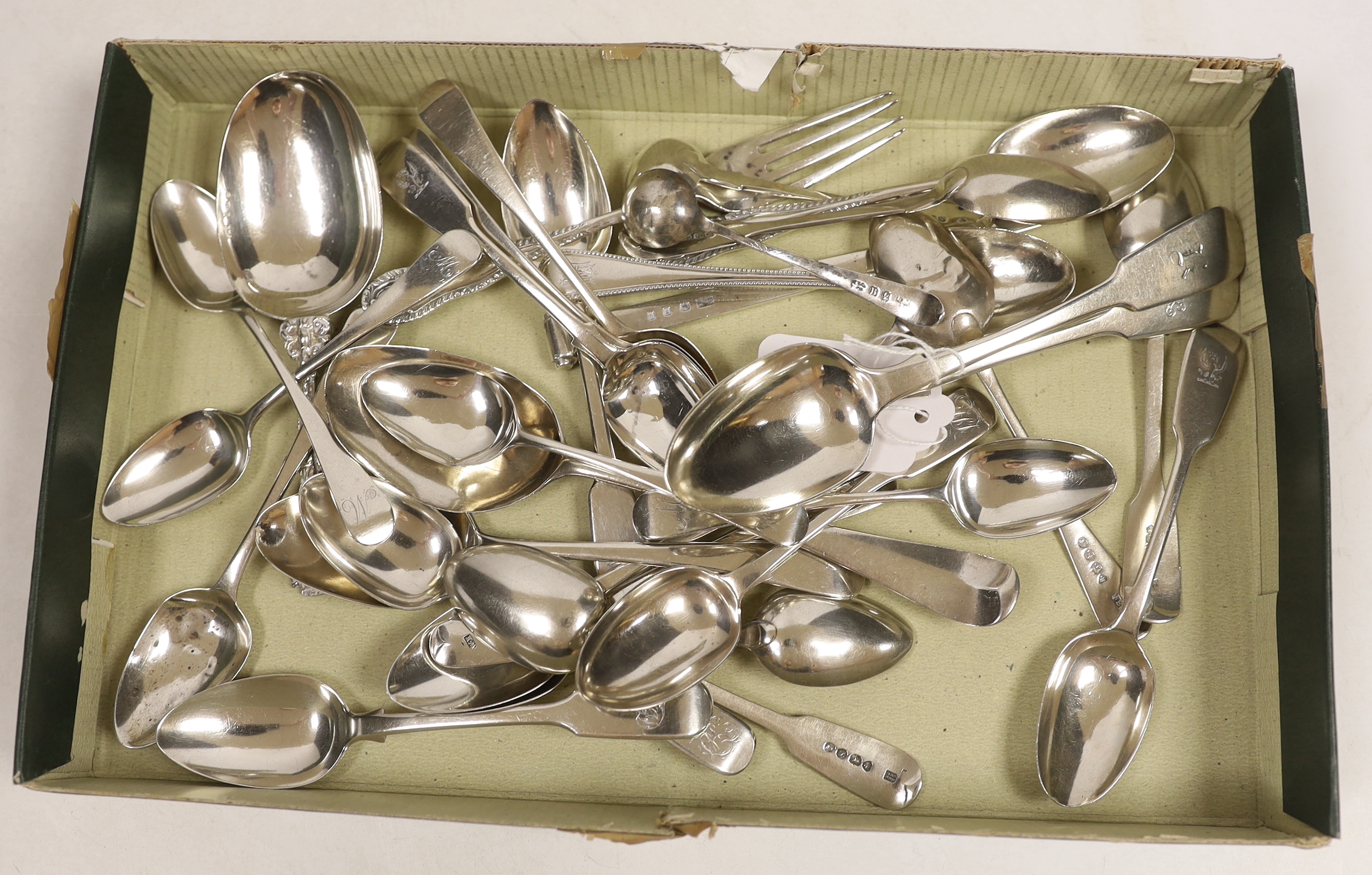 A quantity of assorted 19th century and later silver flatware, including teaspoons, condiment spoons, dessert spoons and a 1930's silver meat skewer